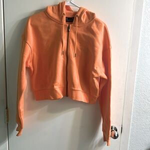 Under Armour zip up hoodie never worn tag still on women’s size medium